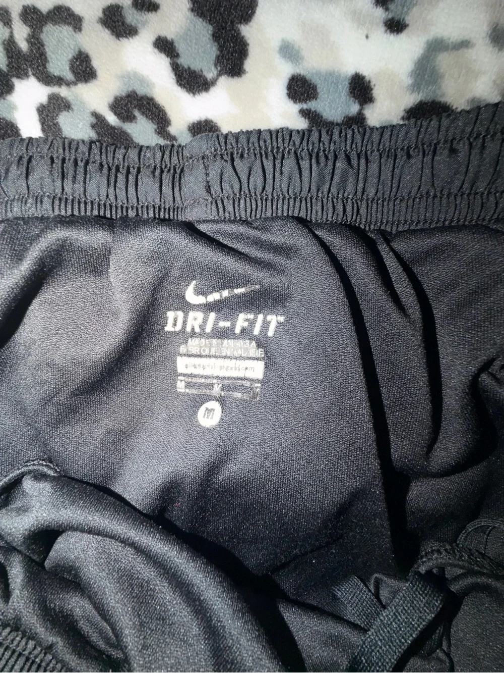 Nike Black Women's Athletic Shorts with White Piping